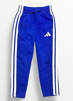 Оригінальні спортивні штани на флісі adidas