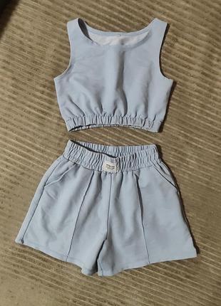 Костюм блакитний на 150-160 см xs