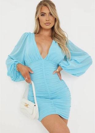 Жіноча міні-сукня prettylittlething блакитна обтисла з довгим рукавом