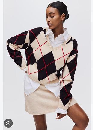 Шерстяной женский свитер от бренда h&m edition.