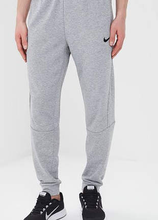 Сірі спортивні штани nike на флісі dri-fit