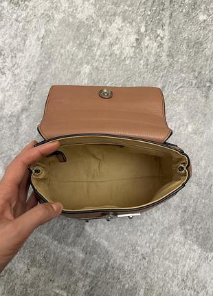 Кожаная мини сумка coccinelle 9