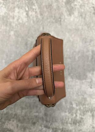Кожаная мини сумка coccinelle 8