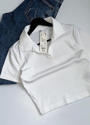 Жіноча укорочена футболка-поло uniqlo cropped skipper short sleeve polo shirt у білому кольорі