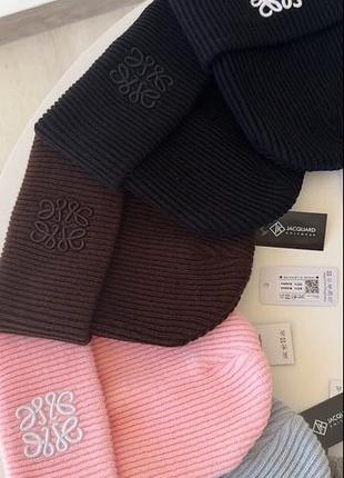 Шапка жіноча jacquard біні в'язана з відворотом шоколадна 50% вовна