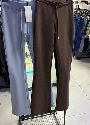Коричневі штани від zara