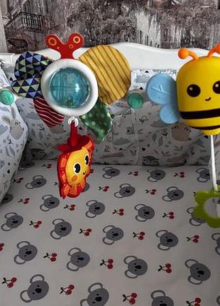 Розвиваюча дуга для ліжечка tiny love різнокольорова