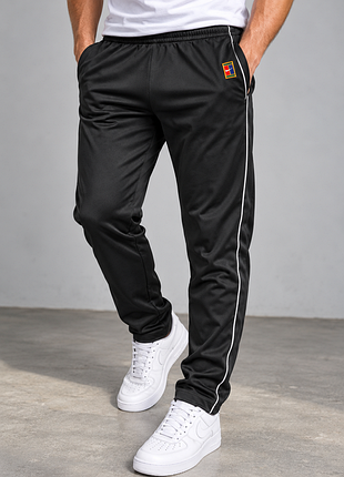 Спортивні штани від бренду nike  court dri-fit heritage
