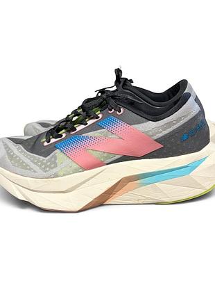 Кросівки для бігу new balance fuelcell rebel v4 сірі різнокольорові
