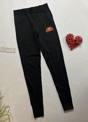 Оригінальні жіночі спортивні легінси ellesse tadino uk10 чорний колір