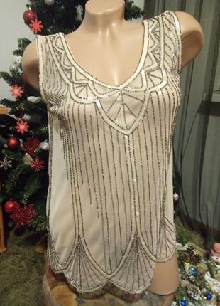 Блузка вишита бісером.