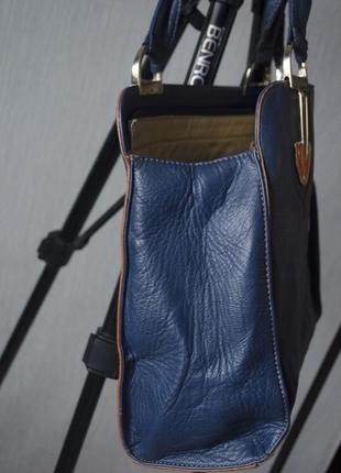 Красива темно синя шкіряна сумка з короткими ремінцями8 фото