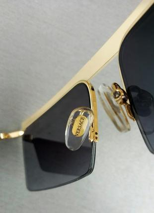 Versace очки женские солнцезащитные черные в золоте узкие стильные8 фото
