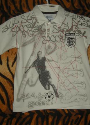 Теніска білого кольору,"next",6 років,100%коттон,португалія.