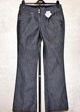 Брендові розкльошені джинси next оригінал1 фото