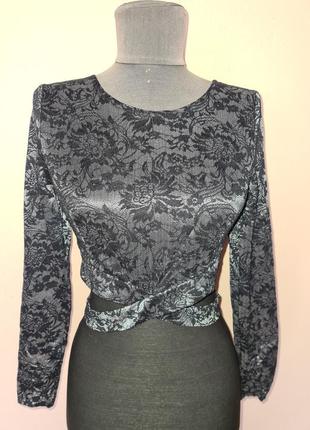 Нарядний топ з перепльотом