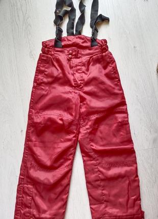 Непромокаемые теплые штаны на 7-8 лет.1 фото
