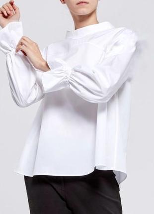 Белая рубашка блузка срезинкой