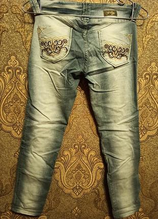 Джинсы 9