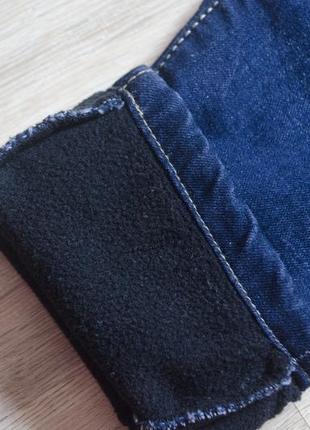 Фірмові утеплені джинси seagul з ременем темно синього кольору  дівчинці3 фото