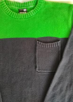Нарядный свитер от известного бренда.4 фото