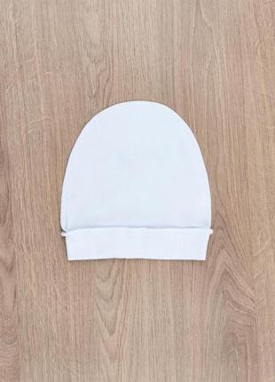 Шапка для новонароджених зовнішні шви