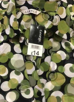 Дуже гарна і стильна брендовий блузка в горошок.