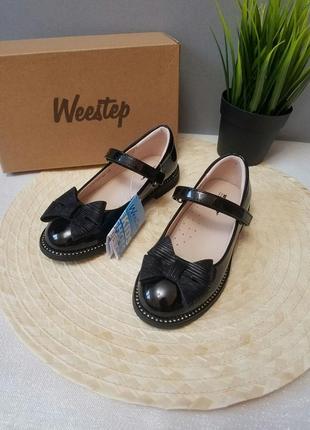 Чорні чепурненькі черевички для дівчинки3 фото