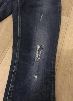 Рваные джинсы с дырками6 фото