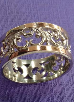 Серебряное ажурное кольцо с золотыми накладками