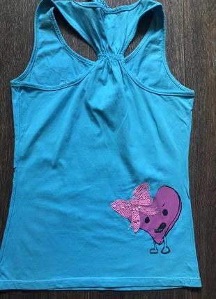 Блакитного кольору майка з сердечками5 фото