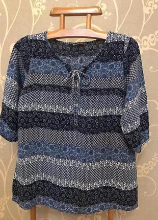 Очень красивая и стильная брендовая блузка..100% вискоза.