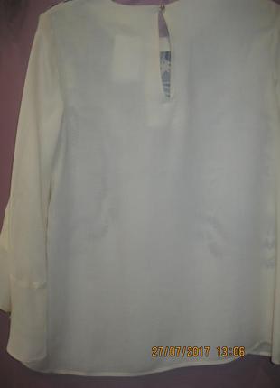 Крутая блузочка цвета топленого молока модными рукавами-воланами2 фото
