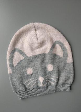 Міла шапочка