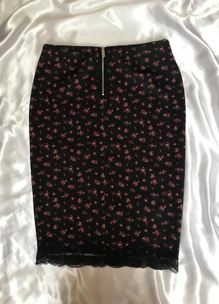 Черная юбка с мелким цветочным принтом2 фото