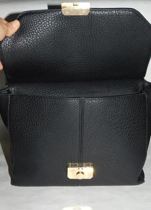 Жіноча чорна сумка з застібкою5 фото