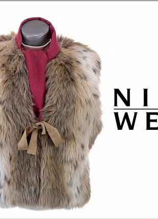 Хутряна безрукавка nine west. річ дуже красива і оригінальна.