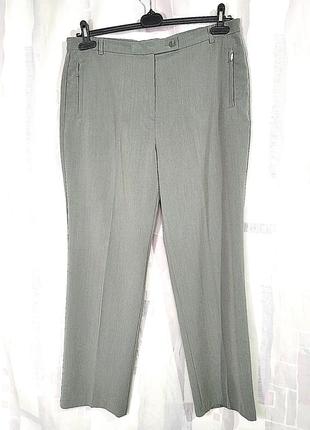 Элегантные брюки с карманами на молниях и подкладкой на животе5 фото