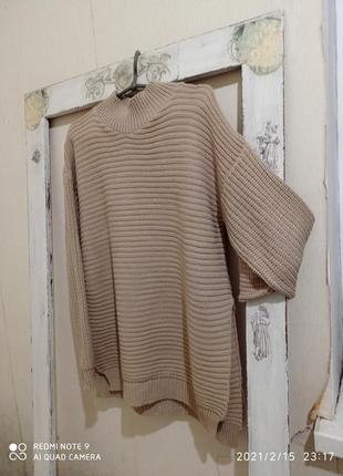 Бежевий светр з глибокими розрізами4 фото