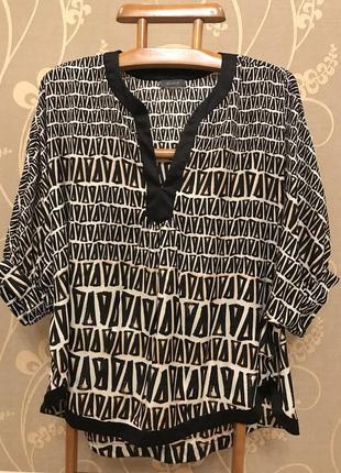 Очень красивая и стильная брендовая блузка.