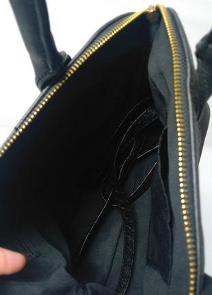 Женская сумка черная с золотыми замками3 фото