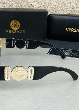 Очки в стиле versace  маска женские солнцезащитные черные с золотым логотипом3 фото