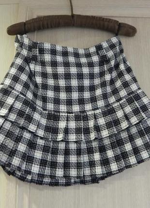 Міні-спідниця сонечко пресована у дрібну чорно-білу клітку