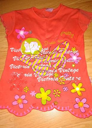 Яскраві футболочки на дівчинку.