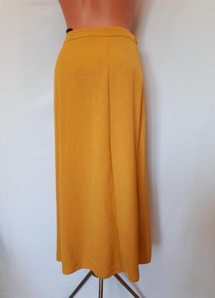 Желто-оранжевая  юбка-миди а-силуэта под пояс primark(размер 32-34)2 фото