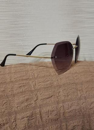 Дизайнерські модні сонцезахисні окуляри5 фото