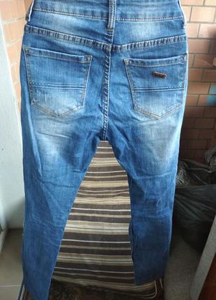 Крутые рваные джинсы стретч на пуговицах 28 размер на укр 482 фото