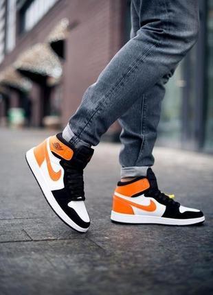 Чоловічі кросівки nike air jordan 1 retro black/white/orange1 фото
