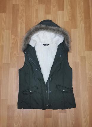 Хутряні жилетки з капюшоном