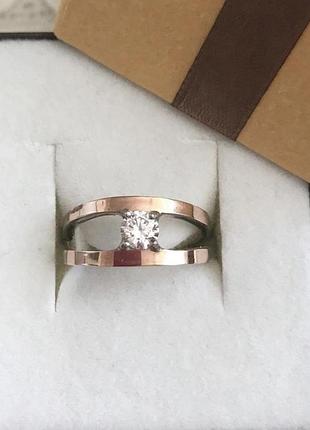 Серебряное кольцо с золотыми вставками